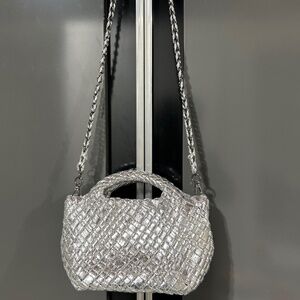 Extremely stylish woven silver designer purse